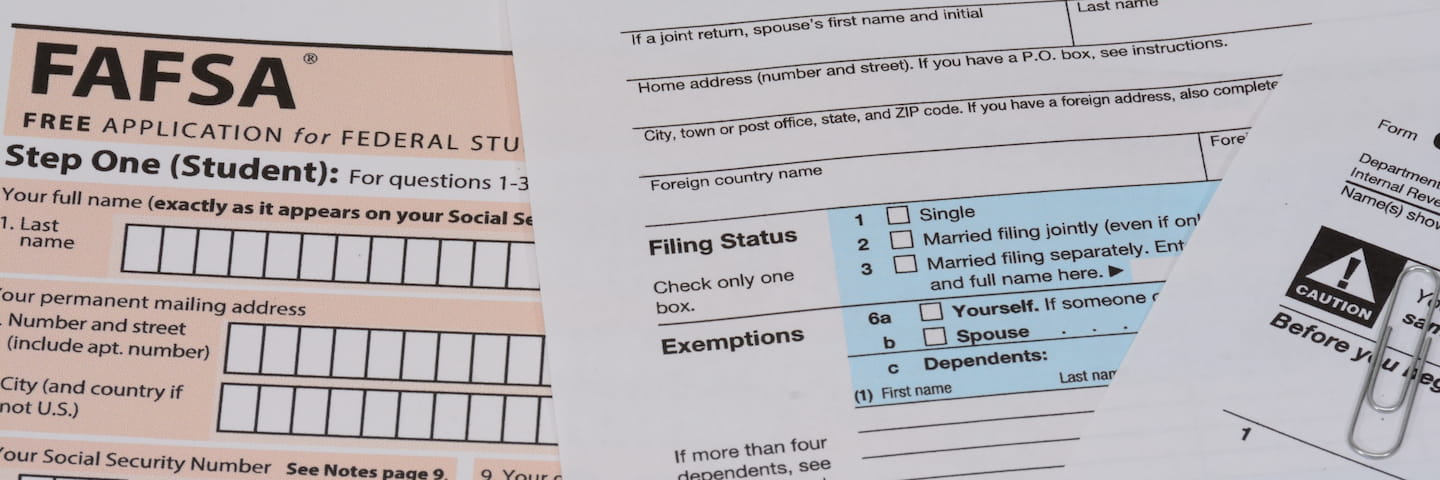 Close-up of a FAFSA (Free Application for Federal Student Aid) form focusing on personal and filing status sections, with a blue highlight on "filing status" options.