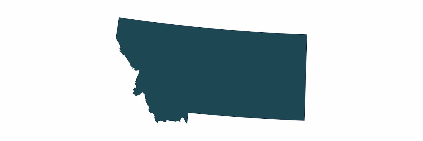 A simple silhouette map of the state of Montana, USA in solid dark teal color on a plain white background.