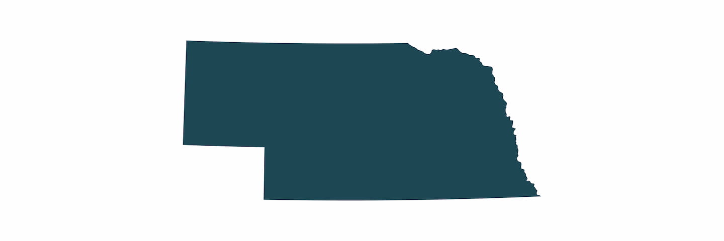 A simple graphic of the state of Kansas depicted in a solid dark teal color on a white background, showing its distinct rectangular shape with a jagged eastern border.