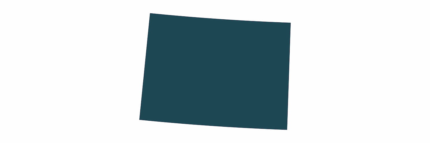 A plain dark teal rectangle tilted slightly to the right on a gray background.